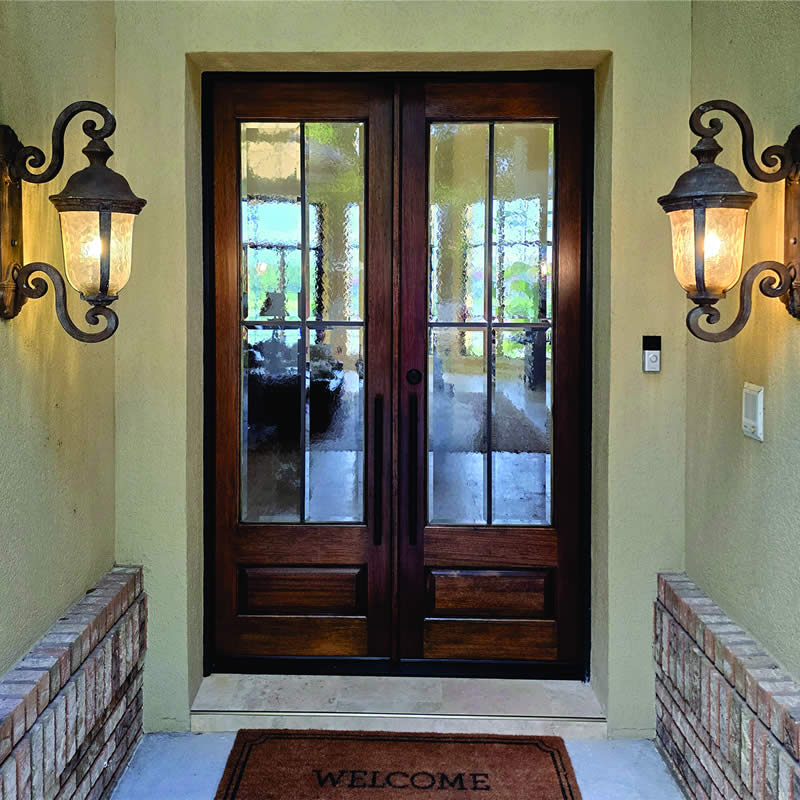 Traditional home makeover in lake mary with mahogany 3/4 lite leaded glass door